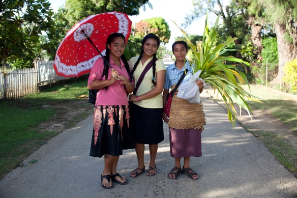 Tongan children wearing ta'ovala mats